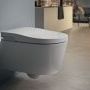 Roca Inspira miska WC ceramiczna podwieszana Rimless odpływ poziomy, 230 V 56.2 x 39 x 47.6 cm biała z deską myjącą z pilotem, z uchwytem montażowym do pilota, oświetleniem LED